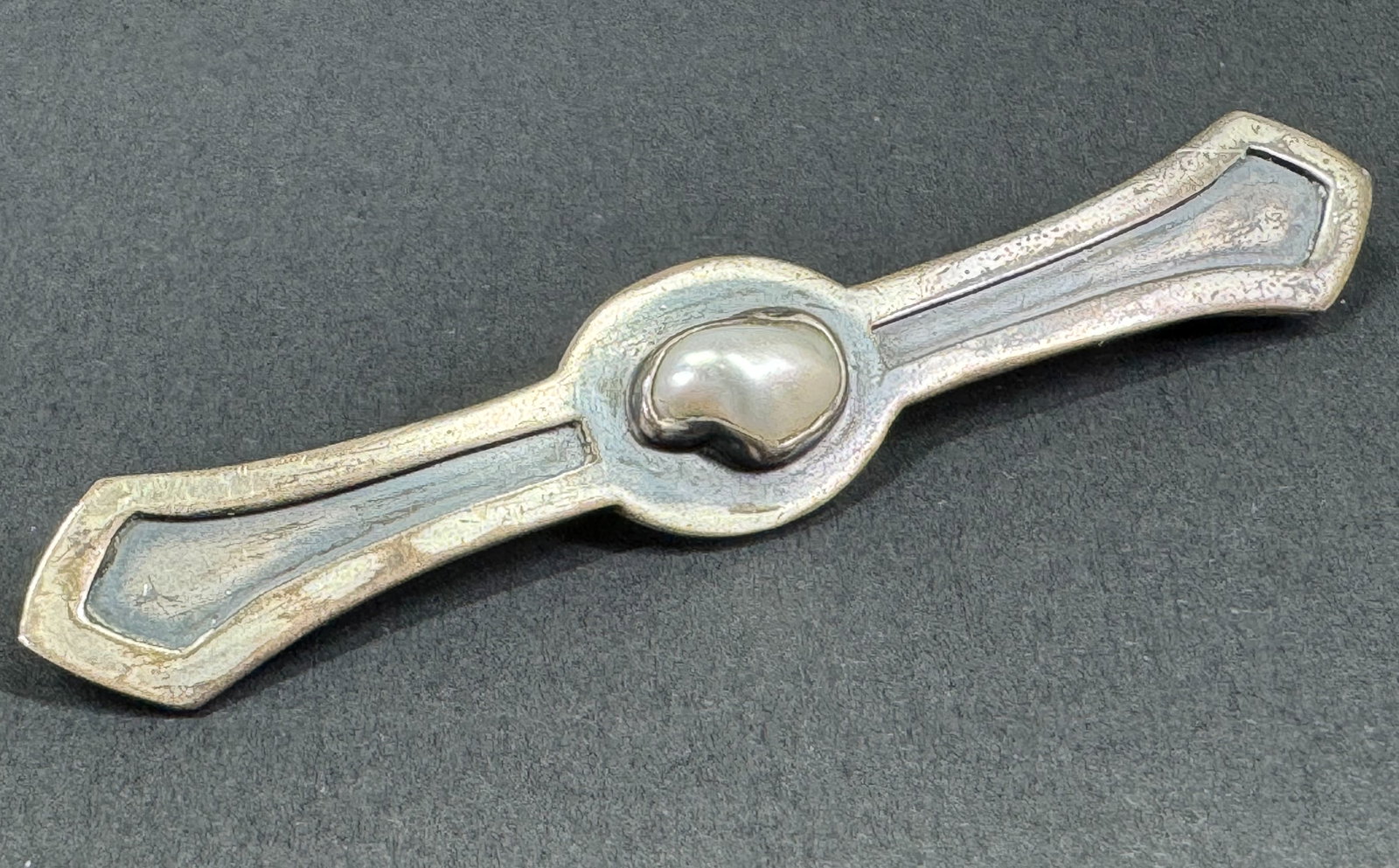 Vintage baroque pearl niello sterling silver pin brooch. Marked NM Sterling. For measures please: Vintage baroque pearl niello sterling silver pin brooch. Marked NM Sterling. For measures please refer to the pictures taken with a measuring tape. Weight: 5.57 Grams. This is a NO RESERVE AUCTION: th