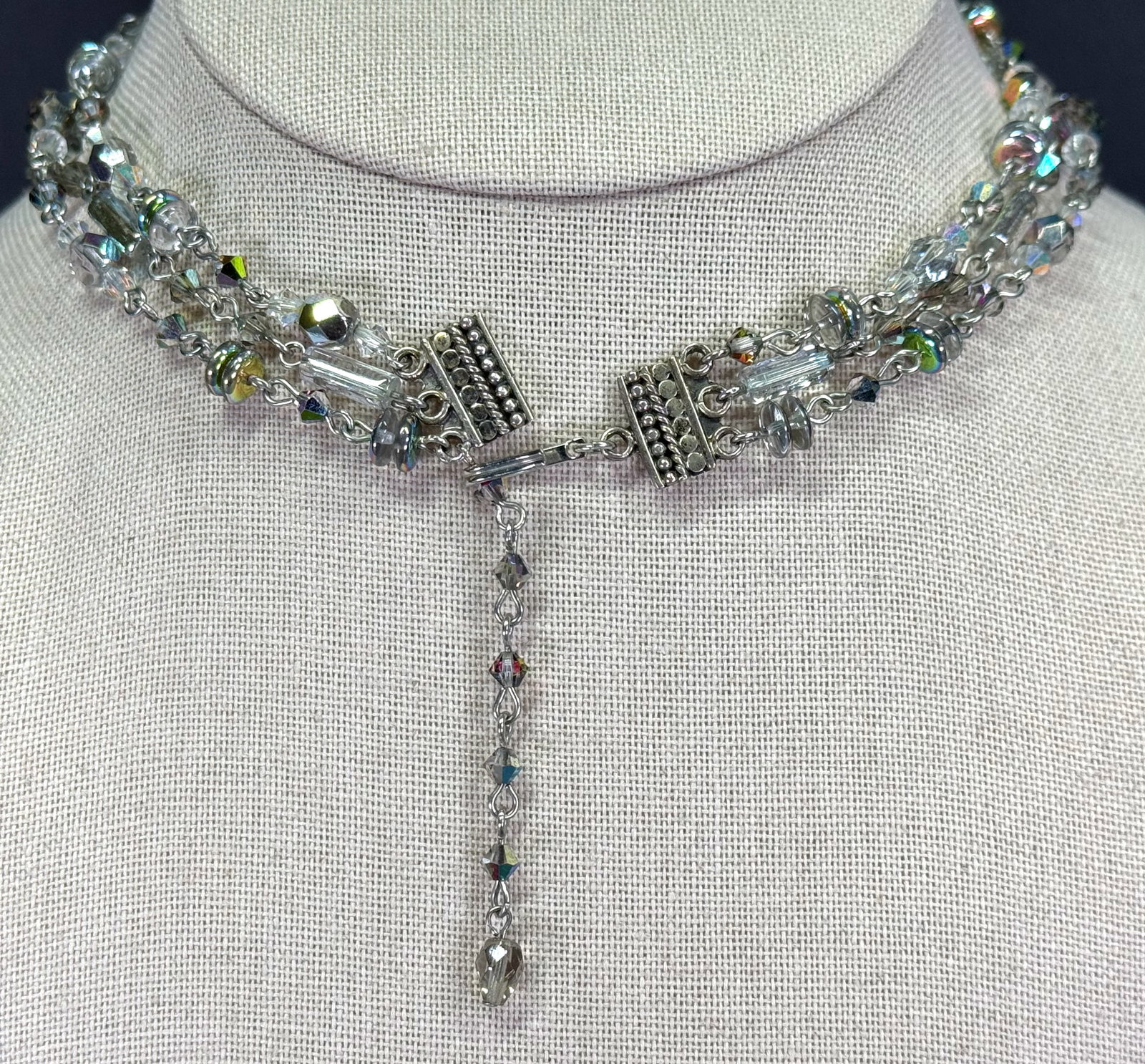 Vintage hand wired AB crystals & clear glass silvertone metal 3 strands choker: Vintage hand wired AB crystals & clear glass silvertone metal 3 strands choker. Unmarked. For measures please refer to the pictures taken with a measuring tape. Weight: 28 Grams. IN HOUSE Estimated* s
