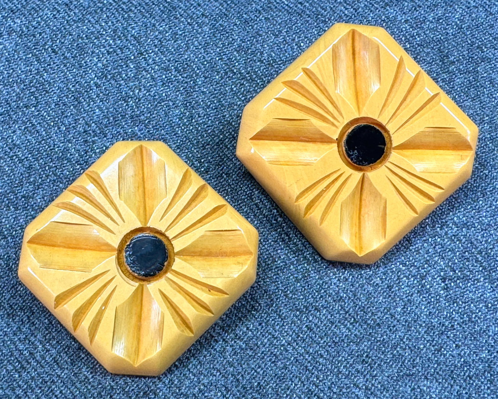 Vintage mother and daughter black enamel carved butterscotch bakelite flower pin brooches. (1 of 6)