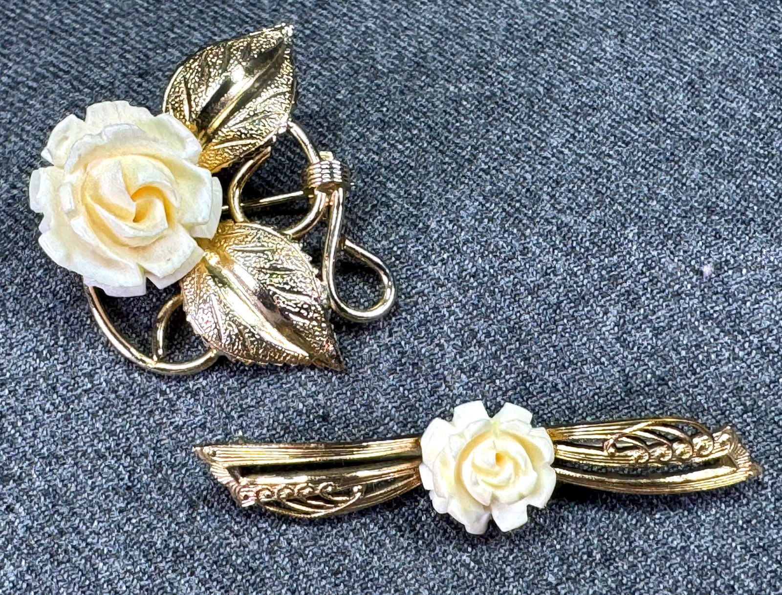 Vintage carved bone flower Gold filled & gold plated pin brooches: Vintage carved bone flower Gold filled & gold plated pin brooches. One is marked 1/20 12K gold filled and the other one is unmarked. For measures please refer to the pictures taken with a measuring ta