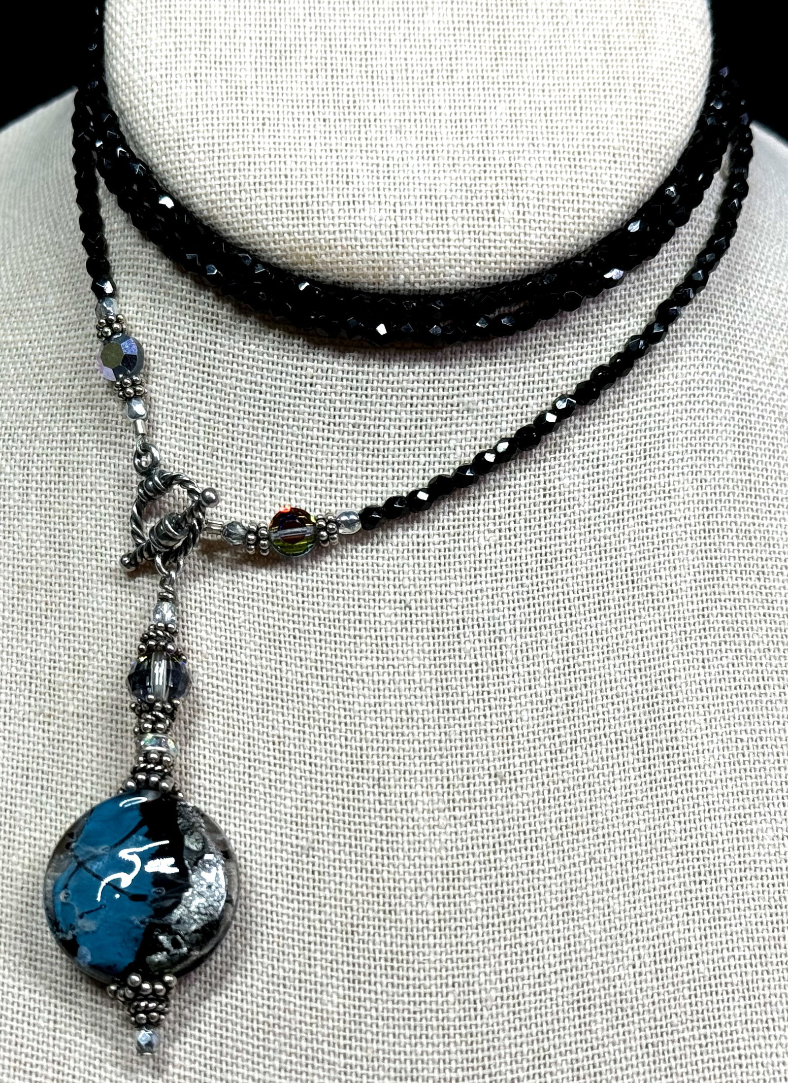 Artsy Dichroic foil grass silvertone metal faceted crystals lariat necklace.: Artsy Dichroic foil grass silvertone metal faceted crystals lariat necklace. Unmarked. For measures please refer to the pictures taken with a measuring tape. Weight: 23 Grams. This is a NO RESERVE AUC