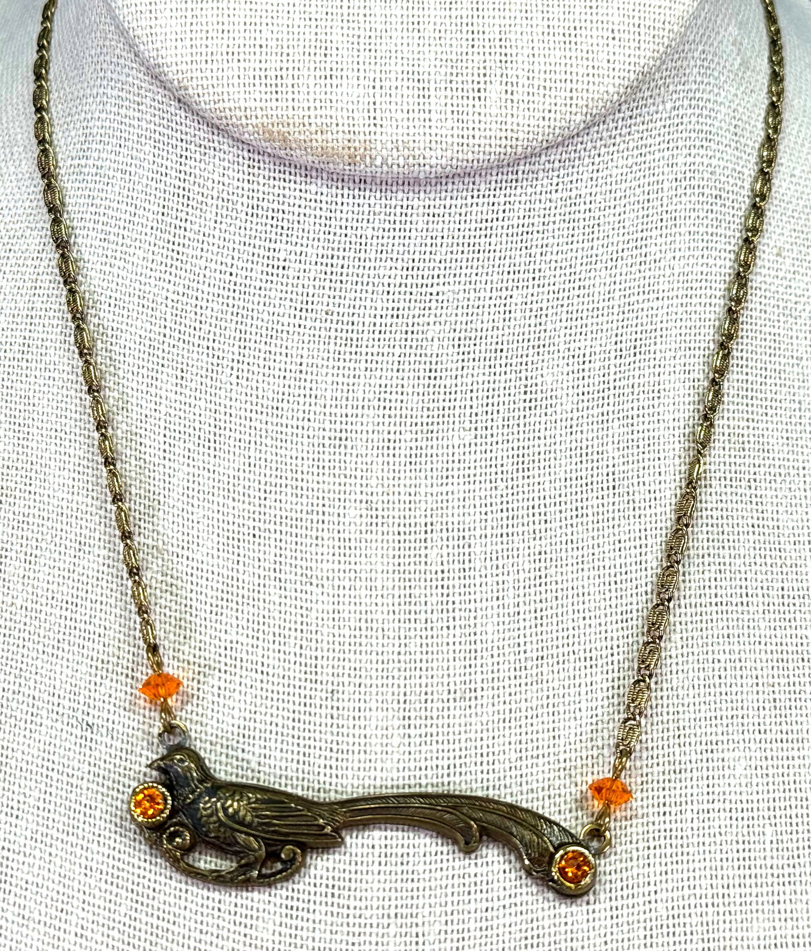 Vintage crystals goldtone metal pheasant bird medallion chain strap choker necklace.: Vintage crystals goldtone metal pheasant bird medallion chain strap choker necklace. For measures please refer to the pictures taken with a measuring tape. Weight: 9 Grams. This is a NO RESERVE AUCTIO