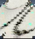 Navajo sterling silver,stabilized turquoise and onyx graduated beaded necklace