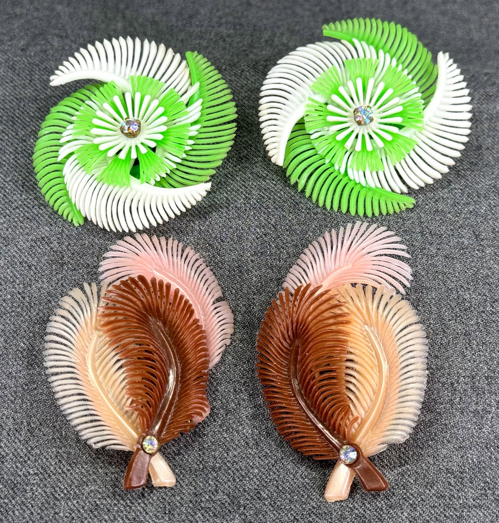 Vintage German assorted jeweled AB crystal color plastic feathers & flower clip on earrings.: Vintage German assorted jeweled AB crystal color plastic feathers & flower clip on earrings. Flowers are marked, feathers are unmarked. For measures please refer to the pictures taken with a measuring
