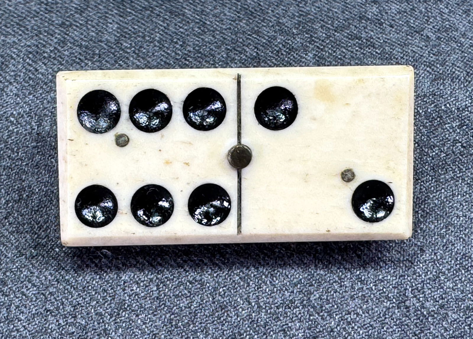 Vintage bone & ebony real dominoes tile pin brooch: Vintage bone & ebony real dominoes tile pin brooch. Unmarked. For measures please refer to the picture taken with a measuring tape. Weight: 17 Grams. IN HOUSE Estimated* shipping and handling cost wit