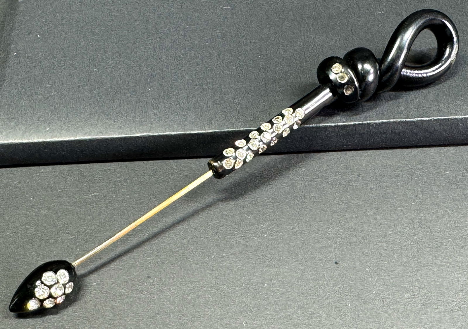 Vintage art deco encrusted clear rhinestones black rope knot celluloid jabot pin. (1 of 7)