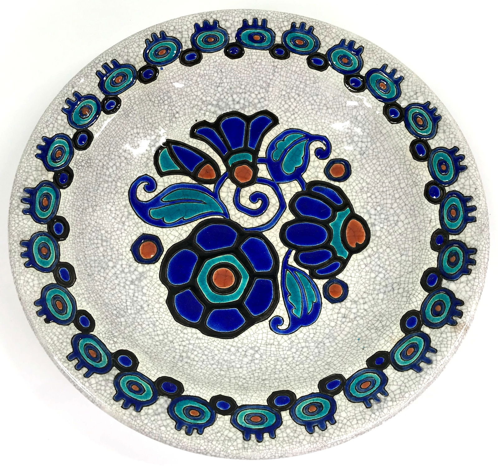 Art Deco Charles Catteau Boch Freres Pottery Plate: Art Deco 1930’s Charles Catteau for Boch Freres La Louviere, Belgium flowers and leaves ceramic plate. Signed on the back Ch Catteau, factory mark and D949. 2 Holes for hanging. Similar example in K