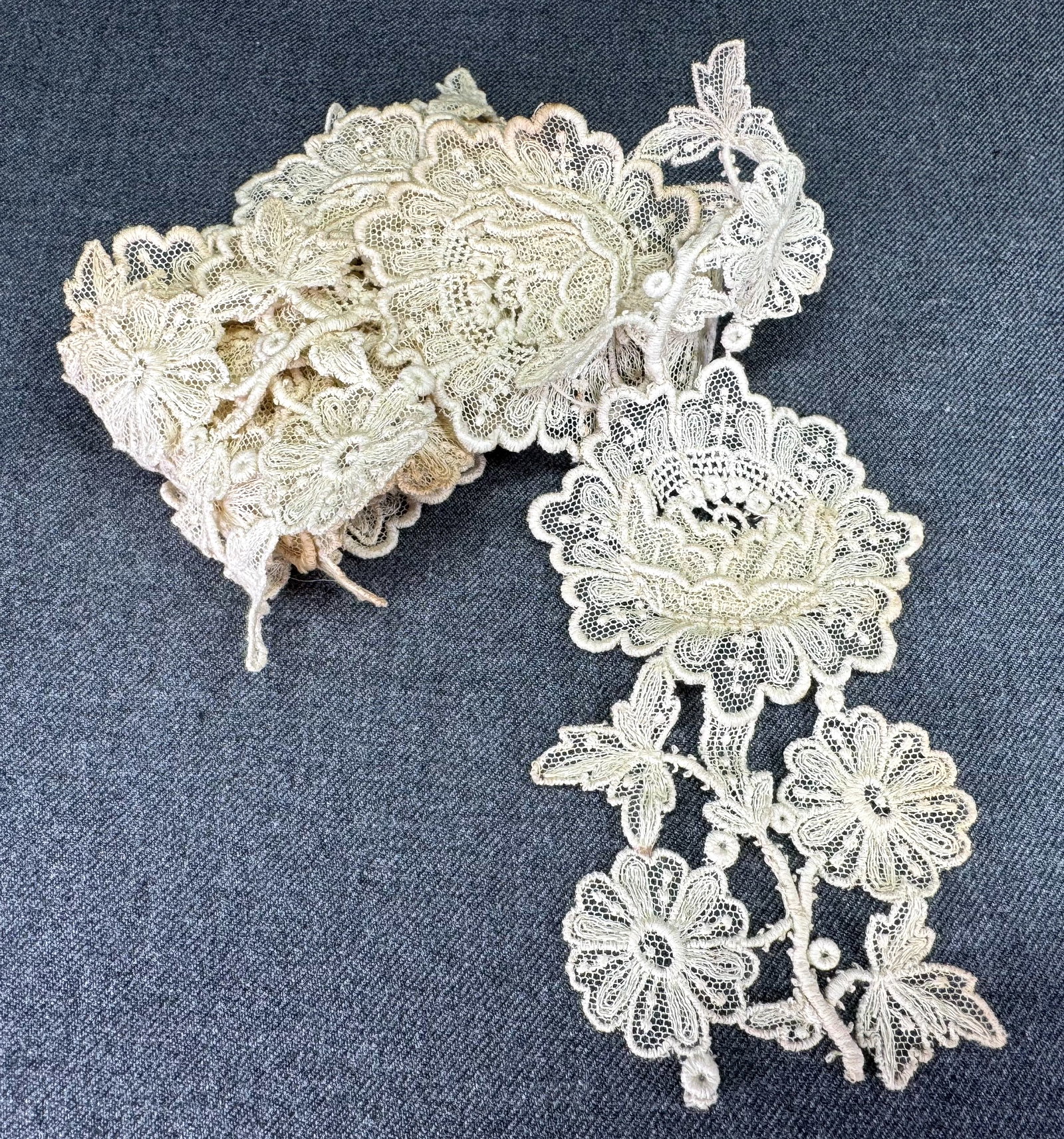 Antique flowers & leaves lace trim.: Antique flowers & leaves lace trim. 1 & 1/4 yards long. For measures please refer to the pictures taken with a measuring tape. IN HOUSE Estimated* shipping and handling cost within the U.S. : $7 We co