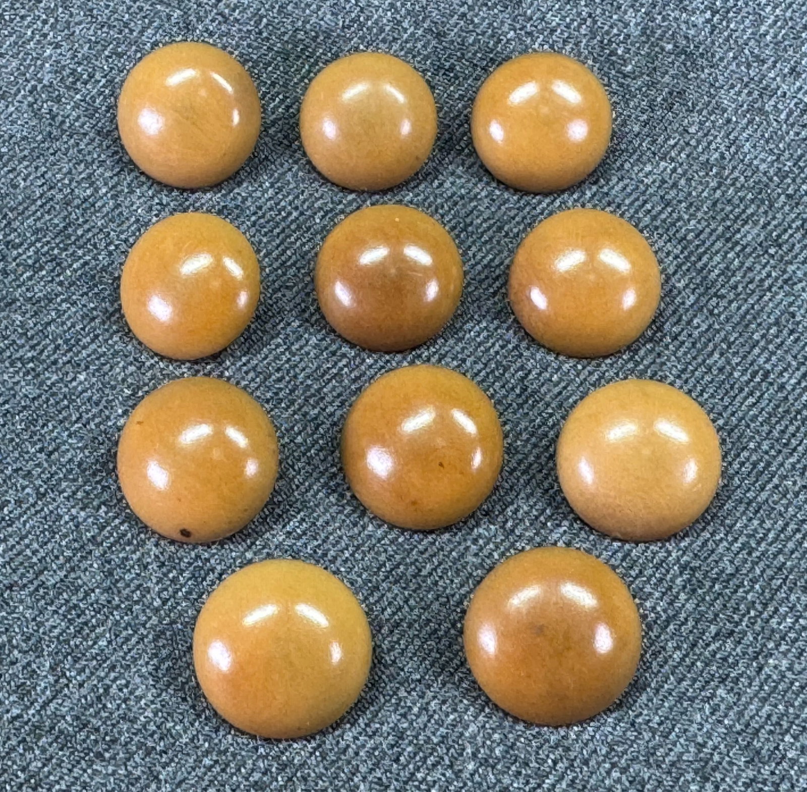 Antique tagua nut dome buttons. Lot of 11: Antique tagua nut dome buttons. Lot of 11 For measures please refer to the pictures taken with a measuring tape. IN HOUSE Estimated* shipping and handling cost within the U.S. : $7 We combine shipping