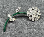 Vintage flower pin brooch. Clear crystals, green enamel silvertone metal.