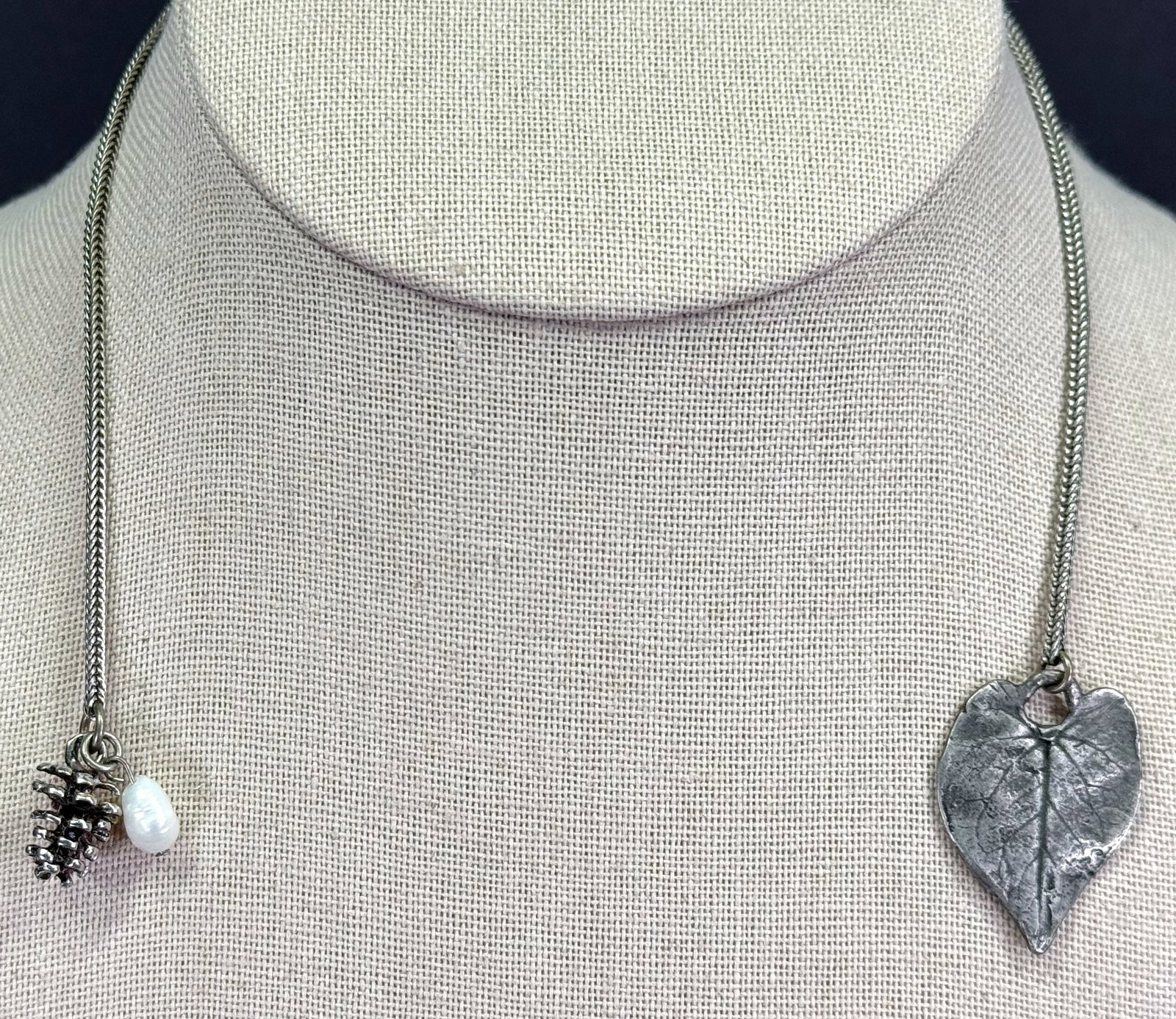 Vintage Celia Landman silver snake chain with leaf pine cone & baroque pearl charms: Vintage Celia Landman silver snake chain with leaf pine cone & baroque pearl charms . Marked. No clasp. For measures please refer to the pictures taken with a measuring tape. Weight: 8 Grams. IN HOUSE