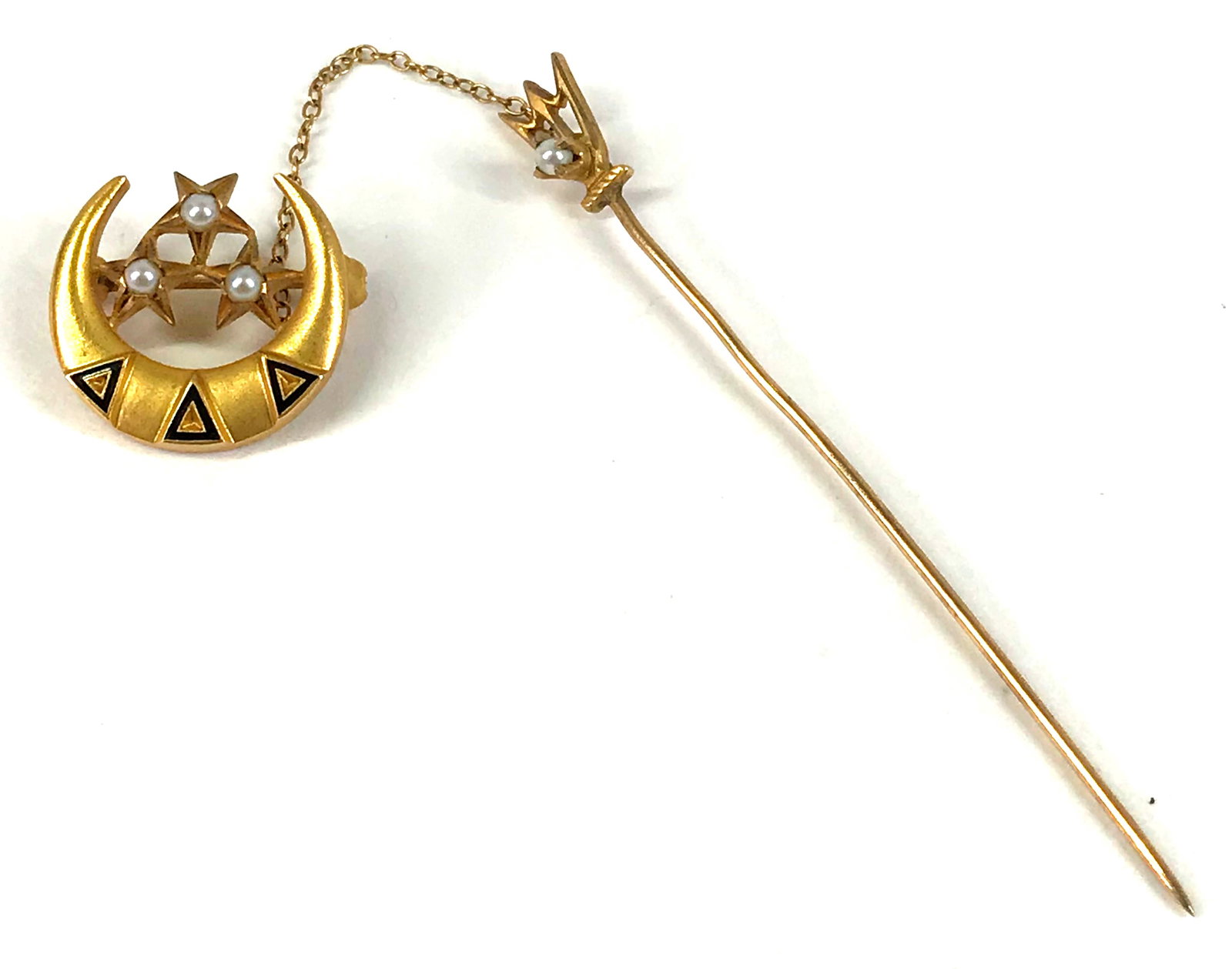 10K Yellow Gold Tri Delta Sorority Badge Trident Stick Pin: 10K yellow gold, seed pearls and black enamel Delta Delta Delta Tri Delta Sorority badge and trident stick pin. Unmarked. Engraved Connie Maire Knapp OR 303. The badge measures 5/8 x 5/8 inch. The sti