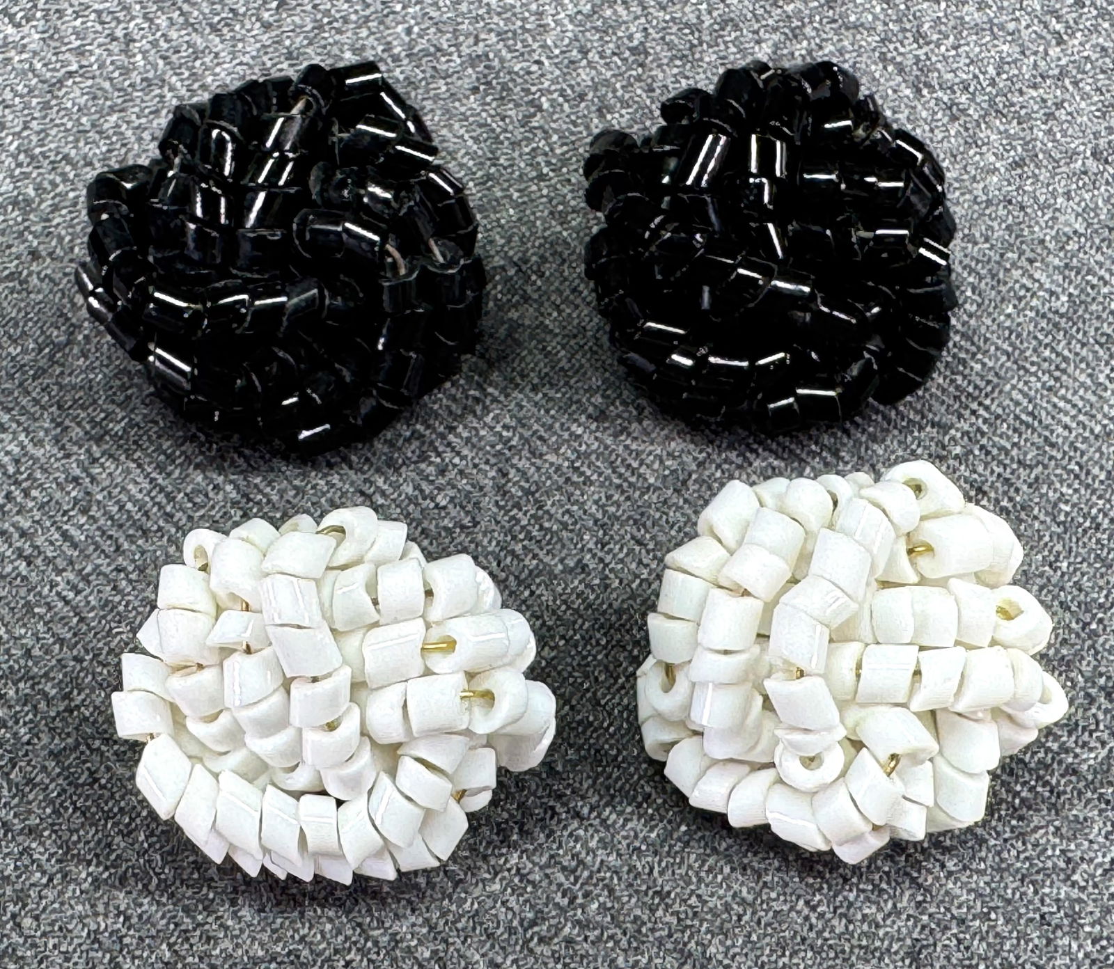 Vintage woven glass beads black silvertone clip & white goldtone stud earrings: Vintage woven glass beads black silvertone clip & white goldtone stud earrings. Unmarked. For measures please refer to the pictures taken with a measuring tape. Weight: 22 Grams. IN HOUSE Estimated* s