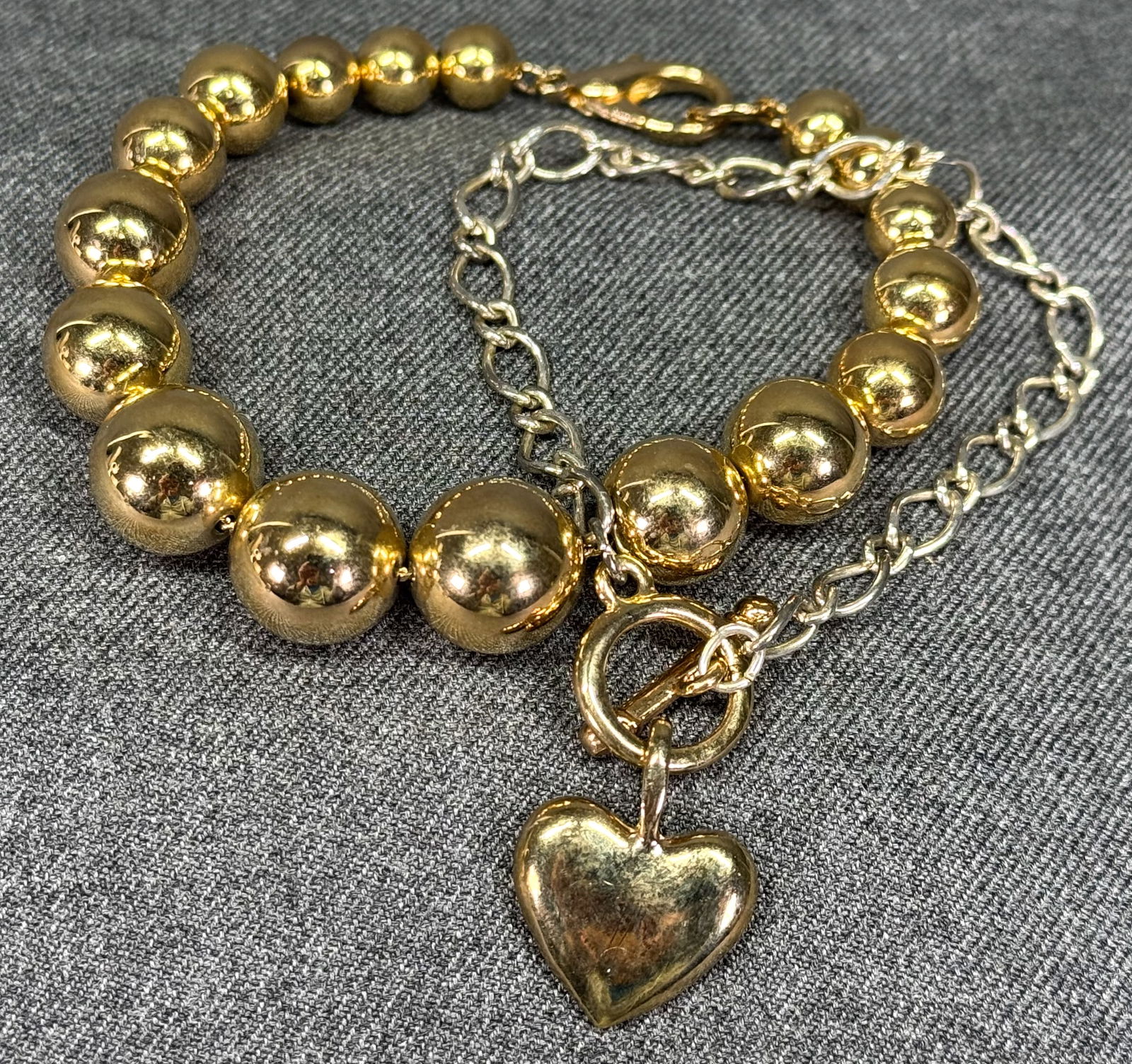 Vintage goldtone graduated beads and silvertone chain with golden heart clasp bracelets (1 of 8)