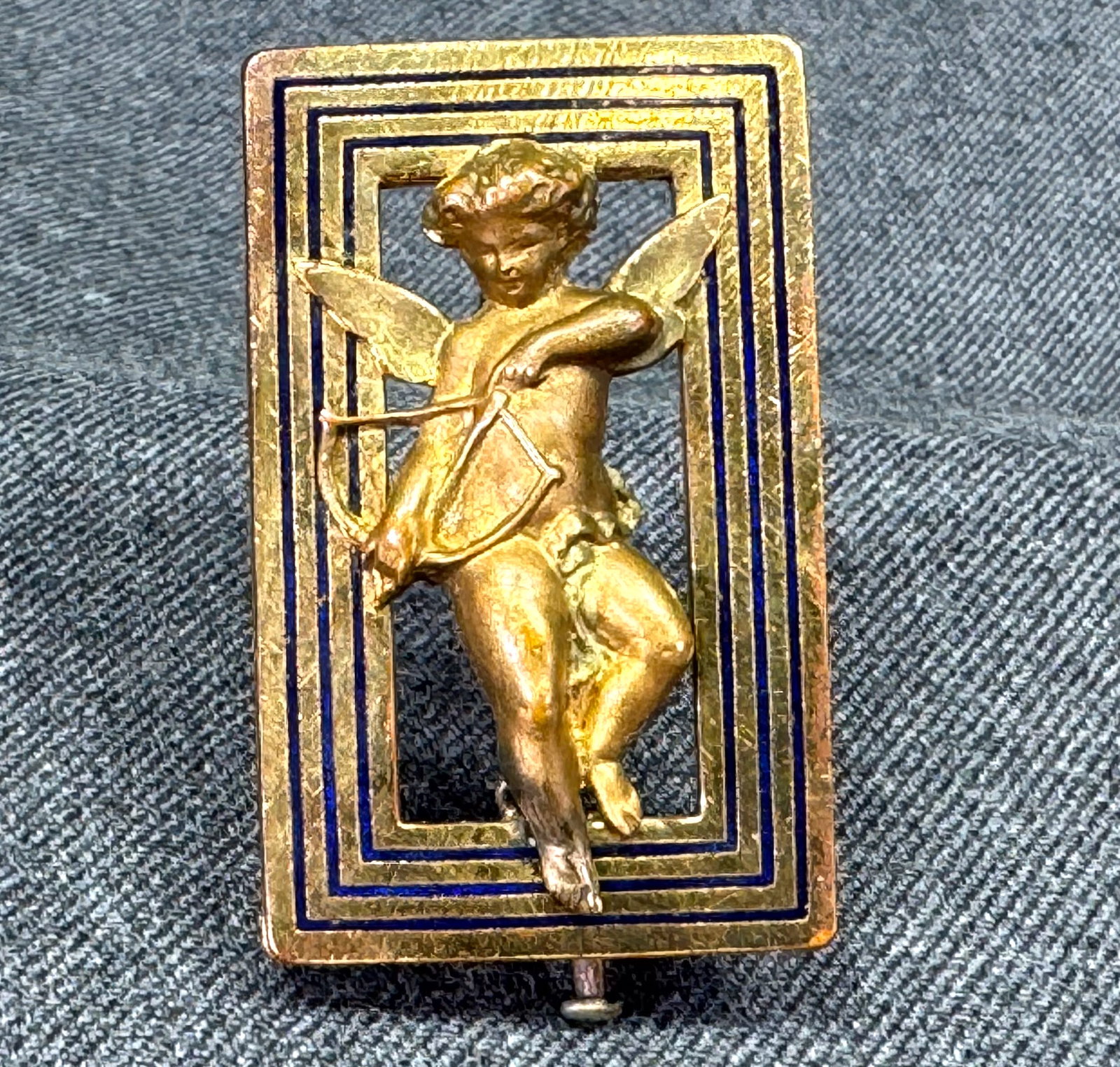 Antique French Black Enamel goldtone metal Cupid Sweetheart Pin Brooch: Antique French Black Enamel goldtone metal Cupid Sweetheart Pin Brooch. Unmarked. For measures please refer to the pictures taken with a measuring tape. Weight: 12 Grams. IN HOUSE Estimated* shipping 