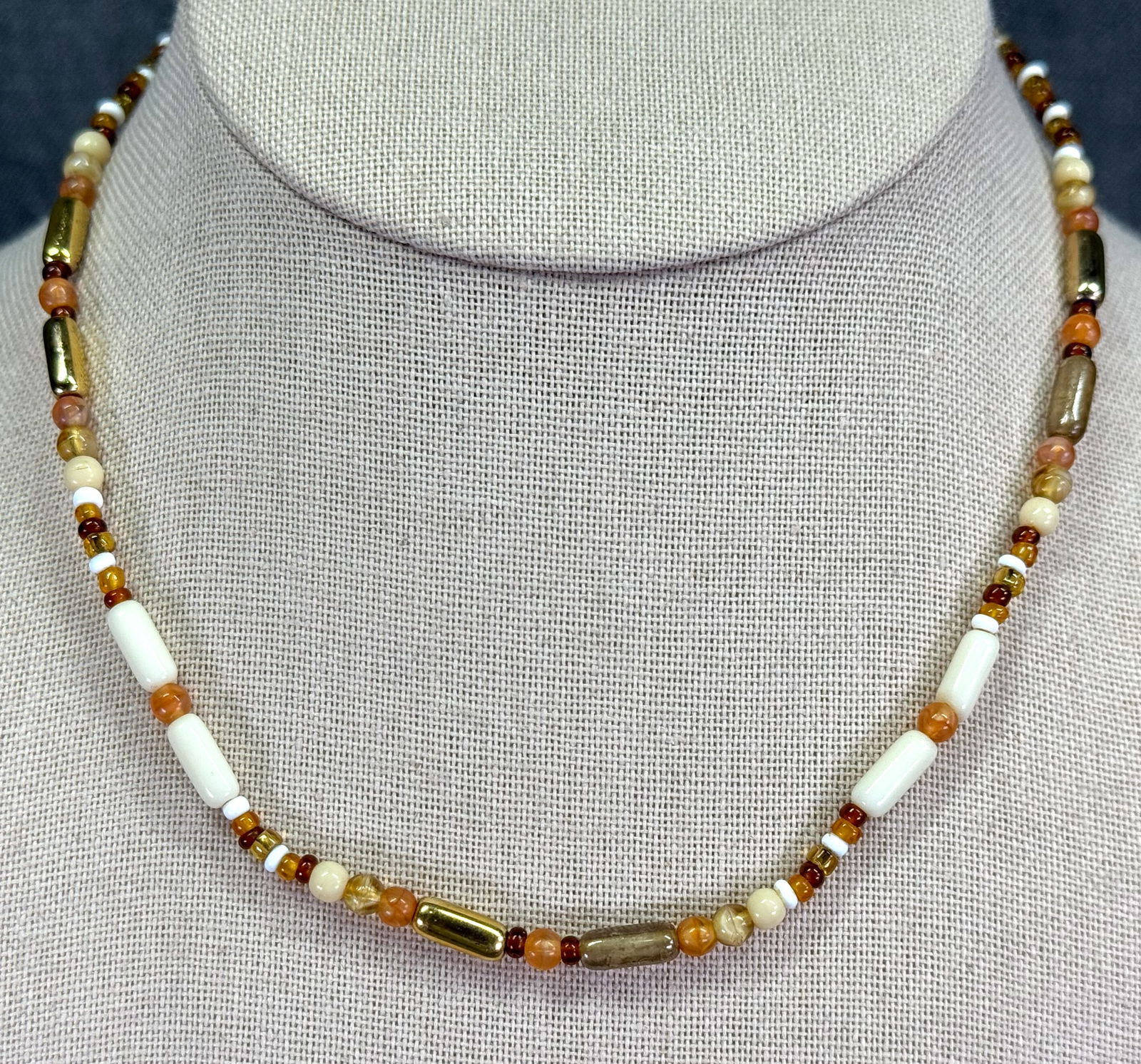 Vintage West Germany fall colors glass beaded collar necklace.: Vintage West Germany fall colors glass beaded collar necklace. Marked. For measures please refer to the pictures taken with a measuring tape. Weight: 6 Grams. IN HOUSE Estimated* shipping and handling