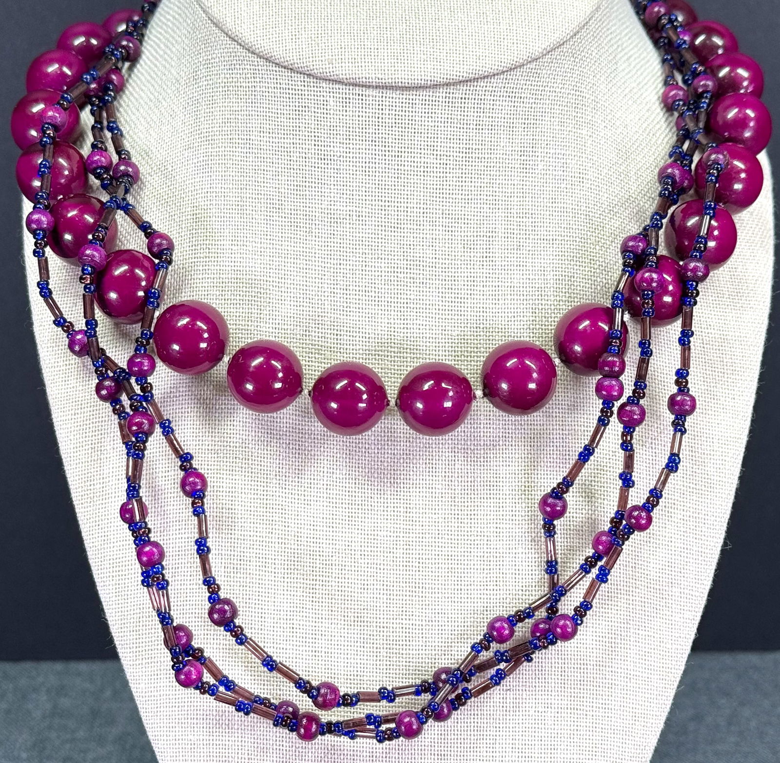 Boho assorted aubergine beaded necklaces: Boho assorted aubergine beaded necklaces. Unmarked. For measures please refer to the pictures taken with a measuring tape. Weight: 72 Grams. IN HOUSE Estimated* shipping and handling cost within the U