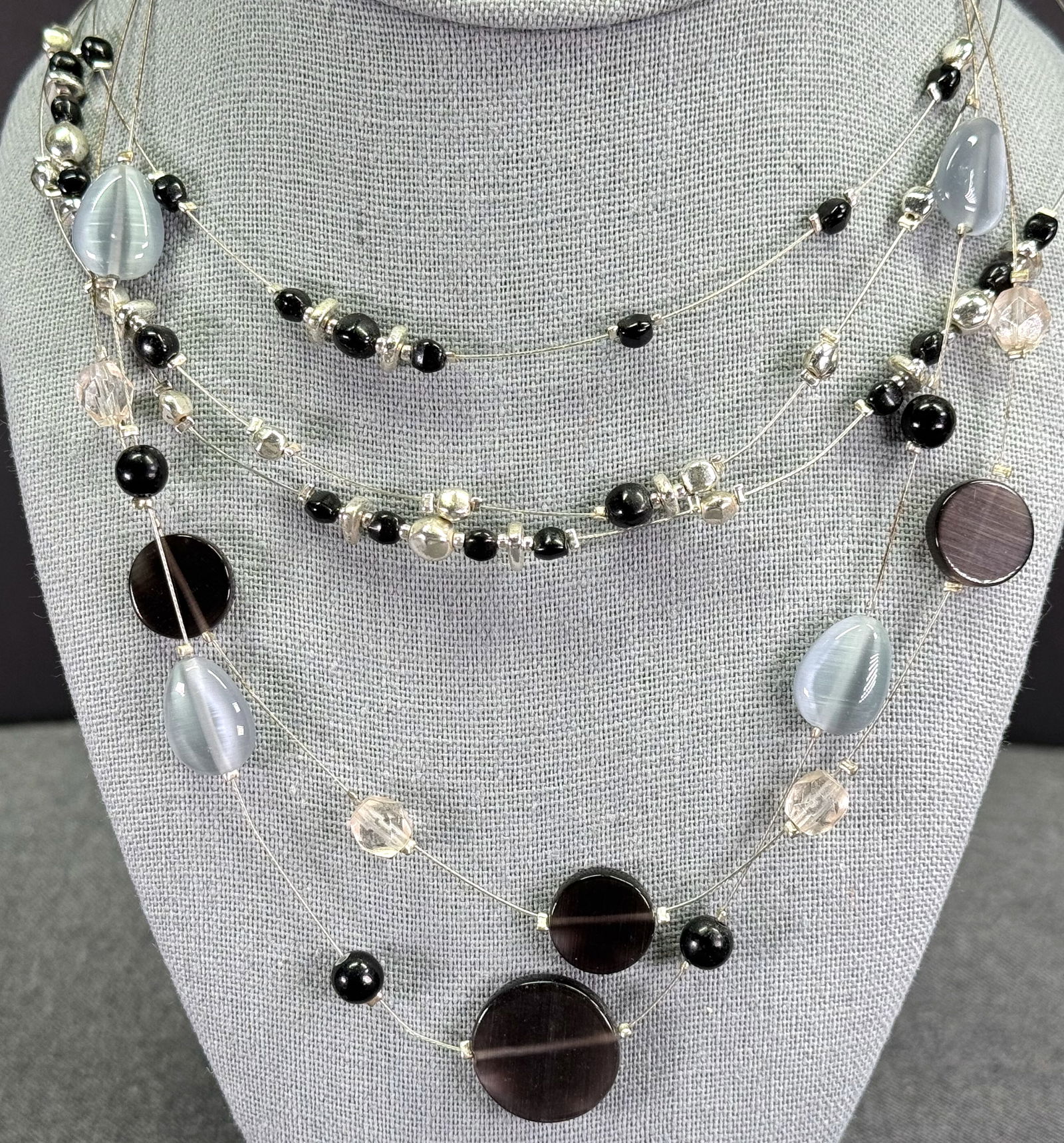 Vintage assorted black & silvertone and greyish plastic beads silvertone wire strand necklaces (1 of 10)