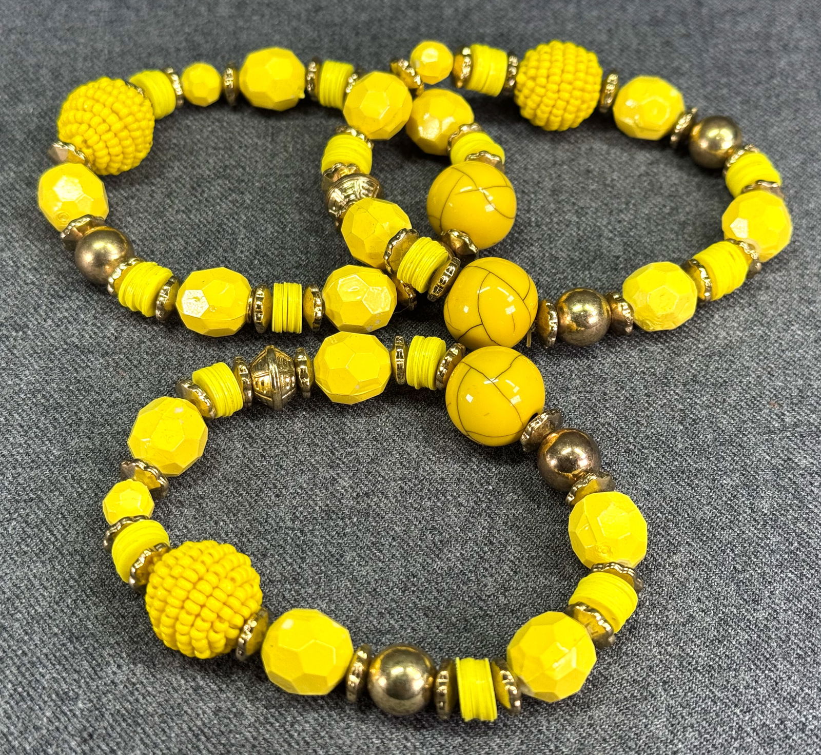 Assorted yellow & goldtone beaded elastic bracelets. Lot of 3 (1 of 5)