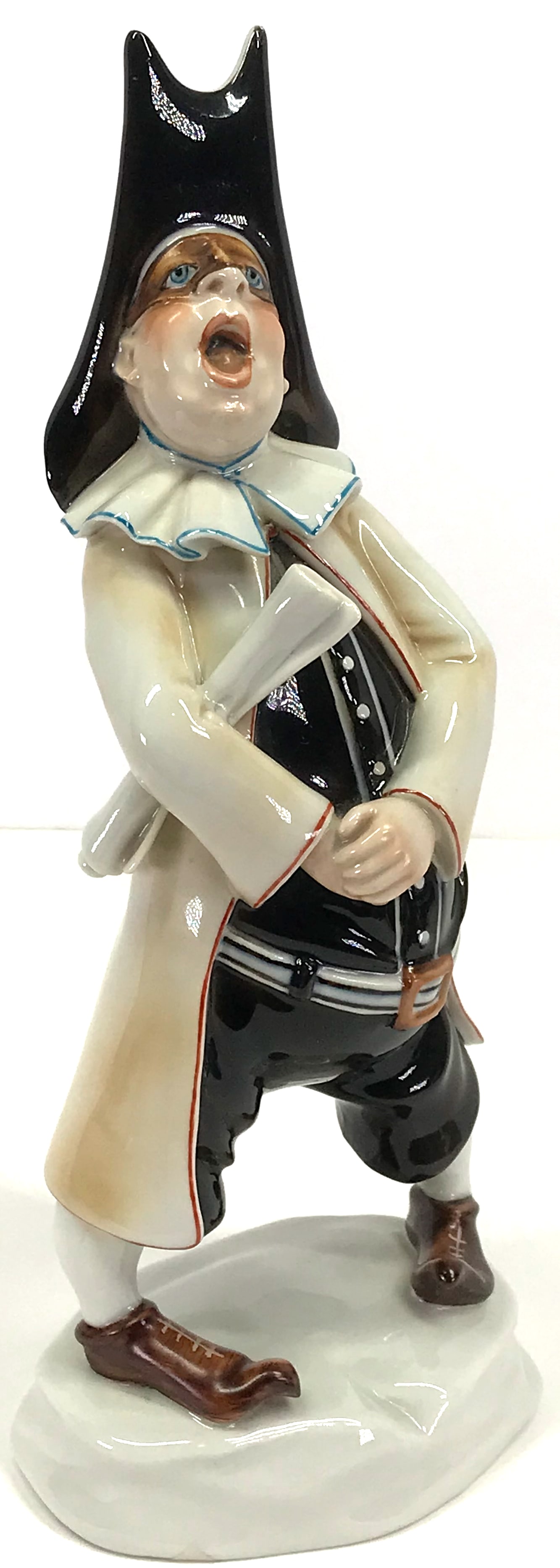Carnivalesque Commedia Dell"Arte Balanzone Cacciapuoti Porcelain Figure.: Carnivalesque Commedia Dell”Arte Balanzone Cacciapuoti Porcelain Figure. Circa 1940-1950. Marked and paper label It measures 9 1/2 inches tall and 4 1/4 inches widest. This is a NO RESERVE AUCTI