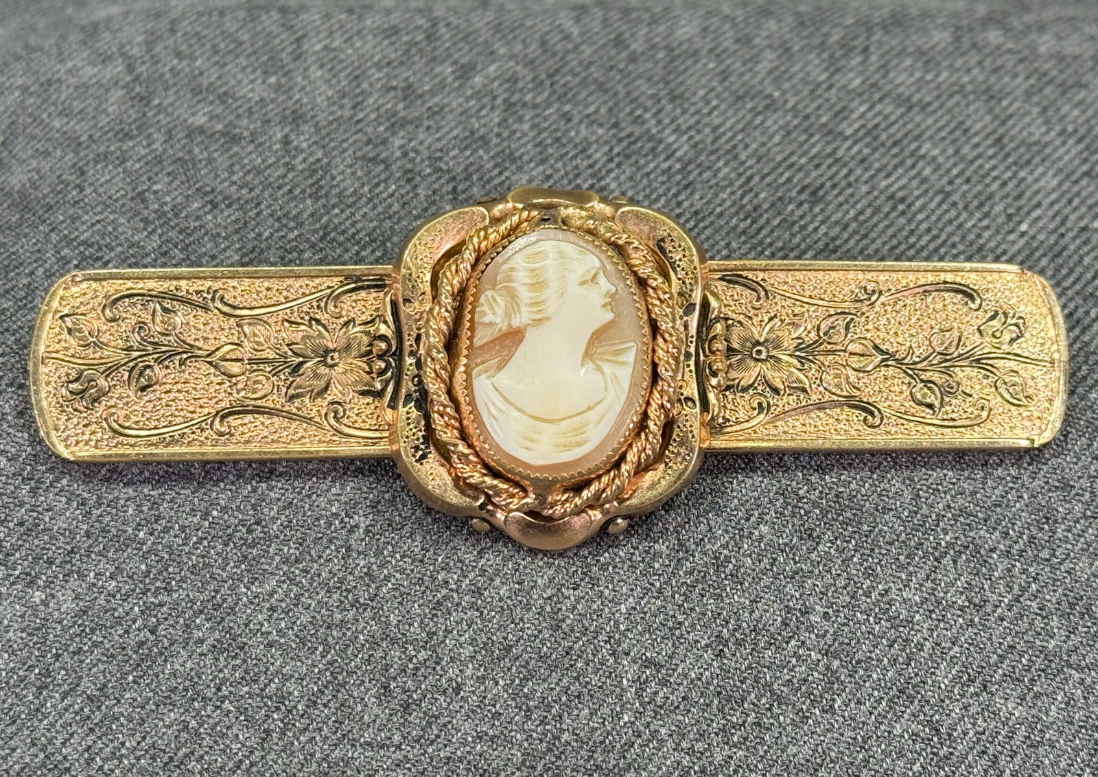Vintage Coro carved shell cameo large bar brooch pin: Vintage Coro carved shell cameo large bar brooch pin. Marked. For measures please refer to the pictures taken with a measuring tape. Weight: 15 Grams IN HOUSE Estimated* SHIPPING & HANDLING COST WITHI