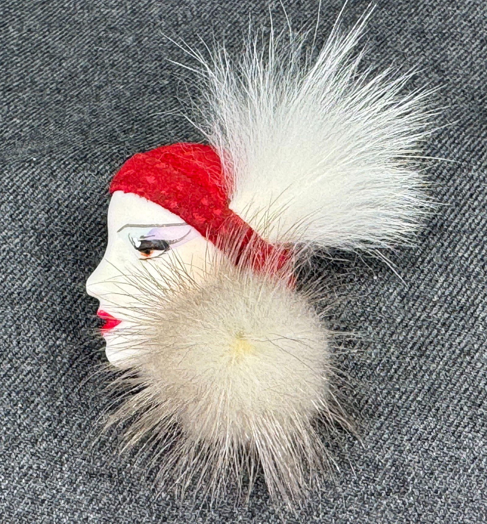 Vintage hand painted resin fabric & fur hat Han Shin Fur Co Ltd flapper lady face brooch pin: Vintage hand painted resin fabric & fur hat Han Shin Fur Co Ltd flapper lady face brooch pin. Marked. For measures please refer to the pictures taken with a measuring tape. Weight: 11 Grams IN HOUSE E