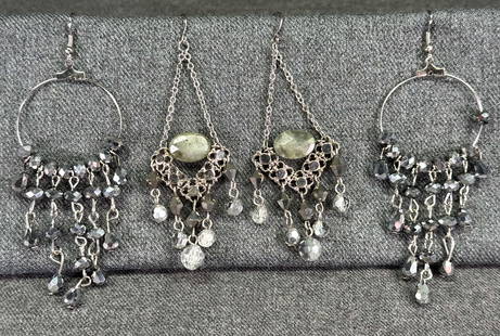 Vintage assorted glass and plastic beads silvertone waterfall hook earrings: Vintage assorted glass and plastic beads silvertone waterfall hook earrings. Unmarked. For measures please refer to the pictures taken with a measuring tape. Weight: 28 Grams. IN HOUSE Estimated* ship