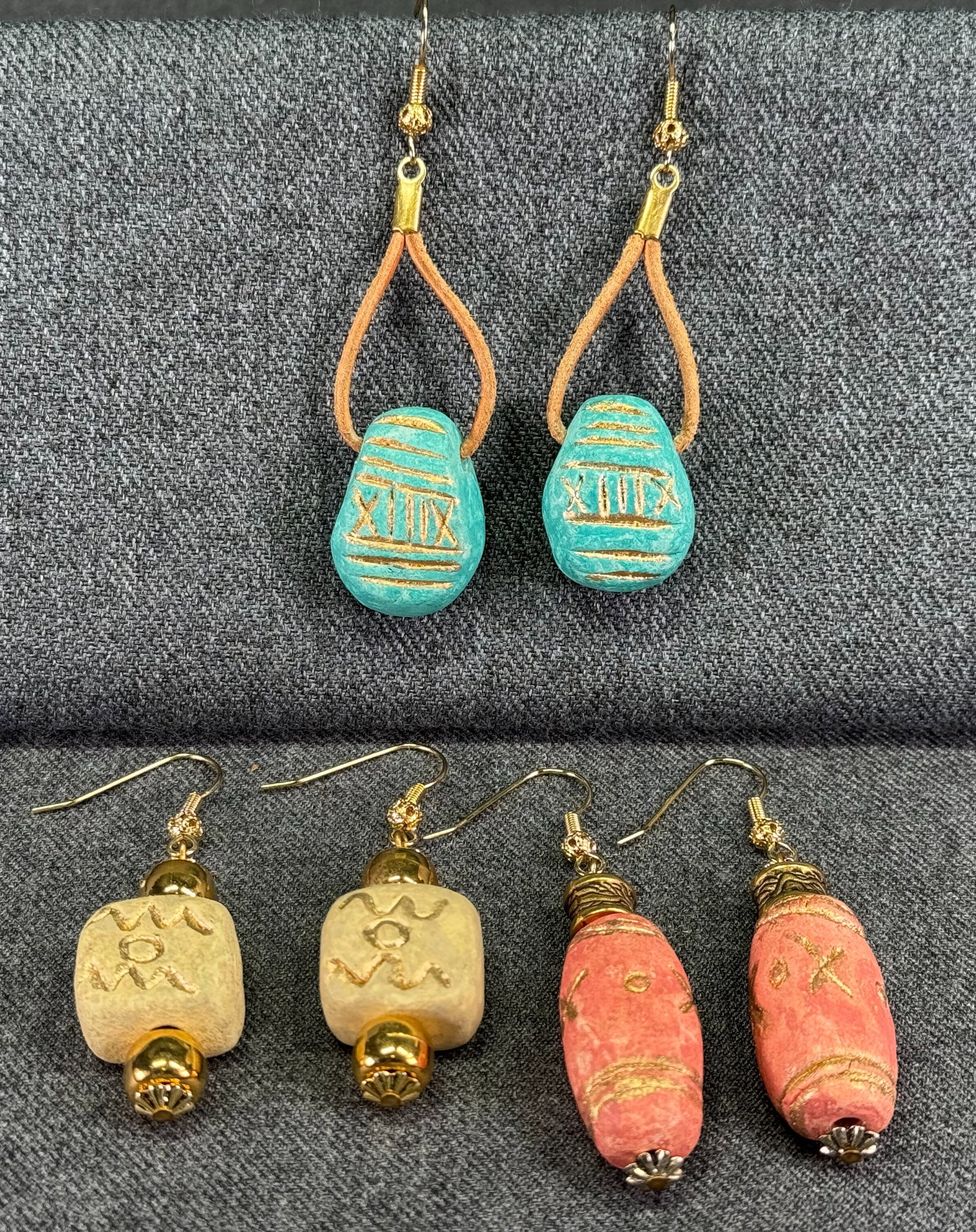 Vintage ethnic style golden accents beige, aqua, coral color pottery hook earrings. Unused. Lot of 3: Vintage ethnic style golden accents beige, aqua, coral color pottery hook earrings. Genuine leather straps. Unused. Lot of 3. Unmarked. For measures please refer to the pictures taken with a measuring