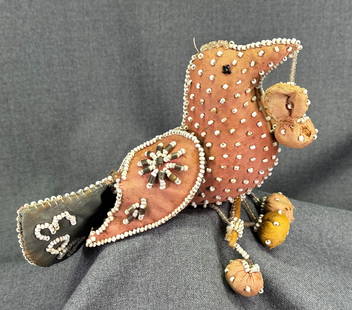 Antique 1903 Native American Iroquois beaded Whimsey bird pin cushion. Hanging berries: Antique 1903 Haudenosaunee (Iroquois) / Mohawk glass beaded Whimsey bird pin cushion. It has hanging berries from the beak and the perch. Reference: similar example at Macdonald Stewart Art Centre Col