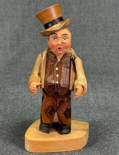 Vintage Anri Italy Man in Top Hat Monocle & Cane Figure. Carved & painted wood: Vintage Anri Italy Man singing in Top Hat Monocle & Cane Figure. Carved & painted wood. Paper label. For measures please refer to the pictures taken with a measuring tape. Weight: 120 grams.< IN HOUSE