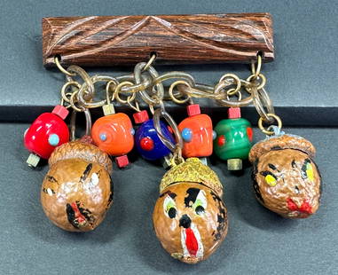 Vintage painted real acorn chinese heads glass lanterns dangles celluloid & wood barrette pin brooch: Vintage painted real acorn chinese heads & glass lanterns dangles celluloid chain wood barrette pin brooch. Unmarked. For measures please refer to the pictures taken with a measuring tape. Weight: 32
