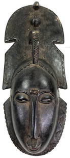 African Guro, Ivory Coast Mask.Carved wood: African Guro, Ivory Coast, Mask. Carved wood. It measures 16 1/2 inches long and 6 3/4 inches widest. Weight: 1 Lb 12 OZ This is a NO RESERVE AUCTION: there are no hidden or confidential reserves, all