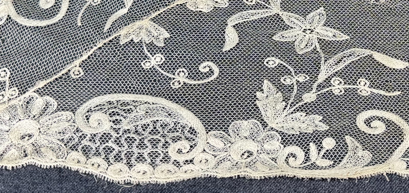 Vintage flowers embroidery tulle lace trim piece: Vintage flowers embroidery tulle lace trim piece. For measures please refer to the pictures taken with a measuring tape. IN HOUSE Estimated* shipping and handling cost within the U.S. : $7 We combine