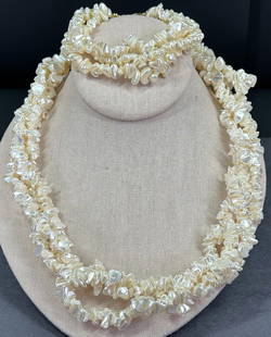 Vintage faux pearl beads 3 strands necklace & matching bracelet set.: Vintage faux pearl beads 3 strands necklace & matching bracelet set. Gold filled clasp. The necklace clasp is marked 14K G.F. For measures please refer to the pictures taken with a measuring tape. Wei