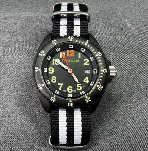 Swiss Made Truglo TG-H3 Quartz Watch.: Swiss Made Truglo TG-H3 Quartz Watch. Quartz movement. Tritium tubes on hands and numerals. Nato nylon strap. Case: 47 mm. IN HOUSE Estimated* shipping and handling cost within the U.S. : $10 We combi