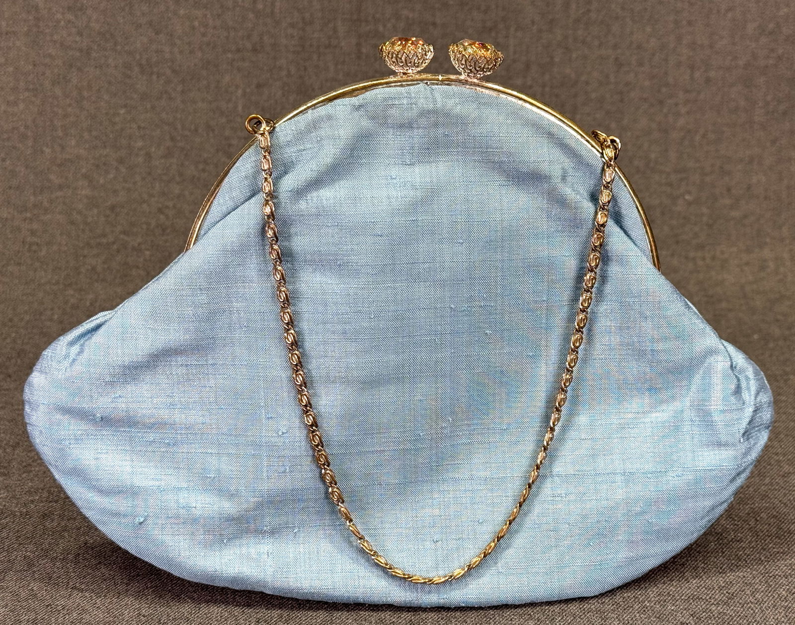 Vintage Kung Bros H.K. Hilton Hotel Aurora Borealis crystals clasp silk purse bag: Vintage Kung Bros Hong Kong Hilton Hotel, AB crystals clasp silk purse bag. Metal frame and chain strap. The interior is lined in fabric. Fabric label. For measures please refer to the pictures taken