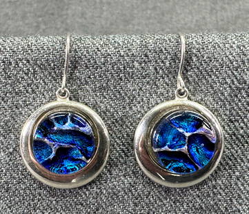 Alaska's Northern Lights captured in glass hook earrings.: Alaska's Northern Lights captured in glass hook earrings. For measures please refer to the pictures taken with a measuring tape. Weight: 16 Grams. IN HOUSE Estimated* SHIPPING & HANDLING COST WITHIN T