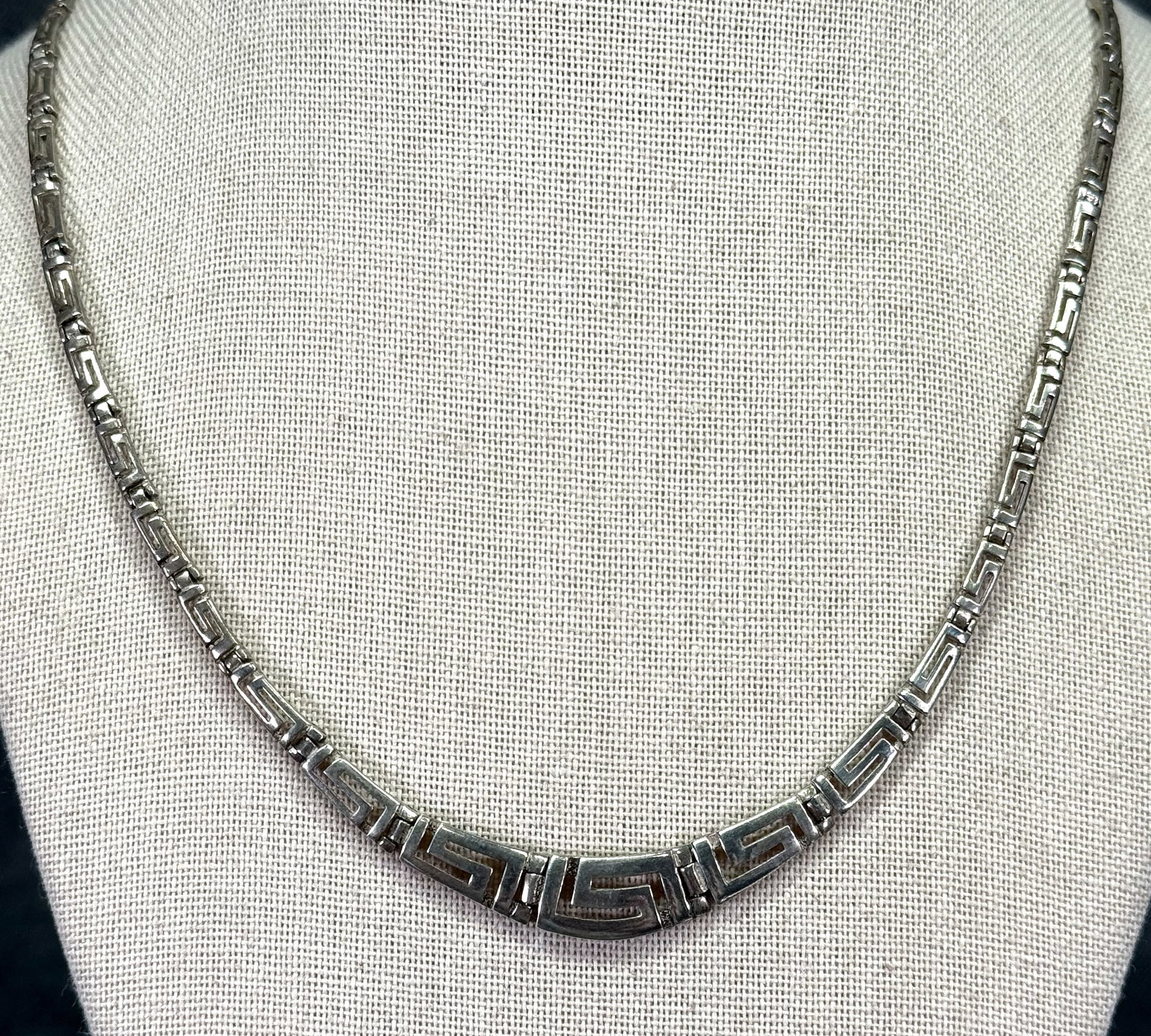 Vintage MCM greek key graduated links sterling silver collar necklace: Vintage MCM greek key graduated links sterling silver collar necklace. Marked 925 026. For measures please refer to the pictures taken with a measuring tape. Weight: 13.64 Grams. IN HOUSE Estimated* S