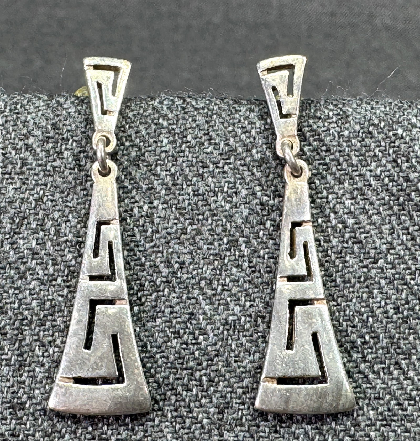 Vintage MCM greek key graduated links sterling silver stud earrings: Vintage MCM greek key graduated links sterling silver stud earrings. Marked 925. For measures please refer to the pictures taken with a measuring tape. Weight: 2.57 Grams. IN HOUSE Estimated* SHIPPING