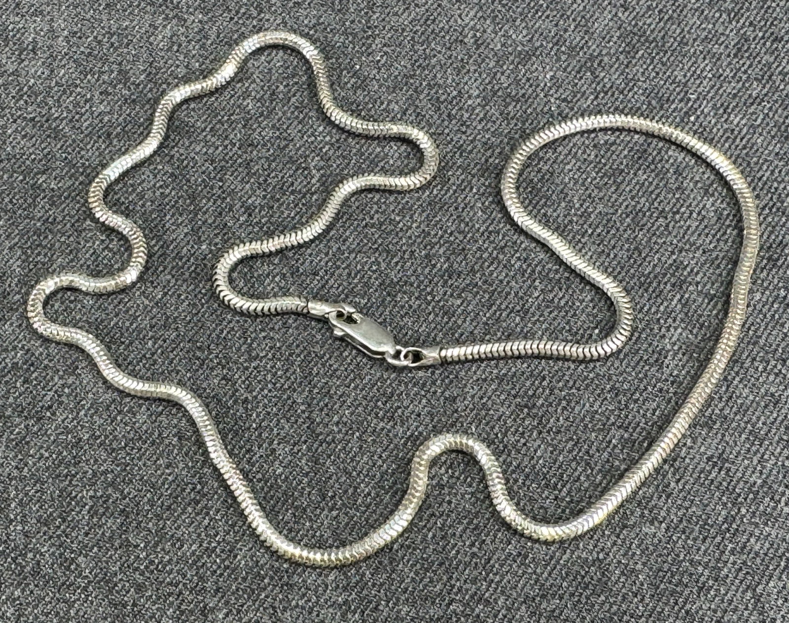 Vintage Italian Sterling silver snake chain strap necklace. Lobster clasp: Vintage Italian Sterling silver snake chain. Lobster clasp. Marked Italy 925. For measures please refer to the pictures taken with a measuring tape. Weight: 9.96 Grams. IN HOUSE Estimated* SHIPPING & 