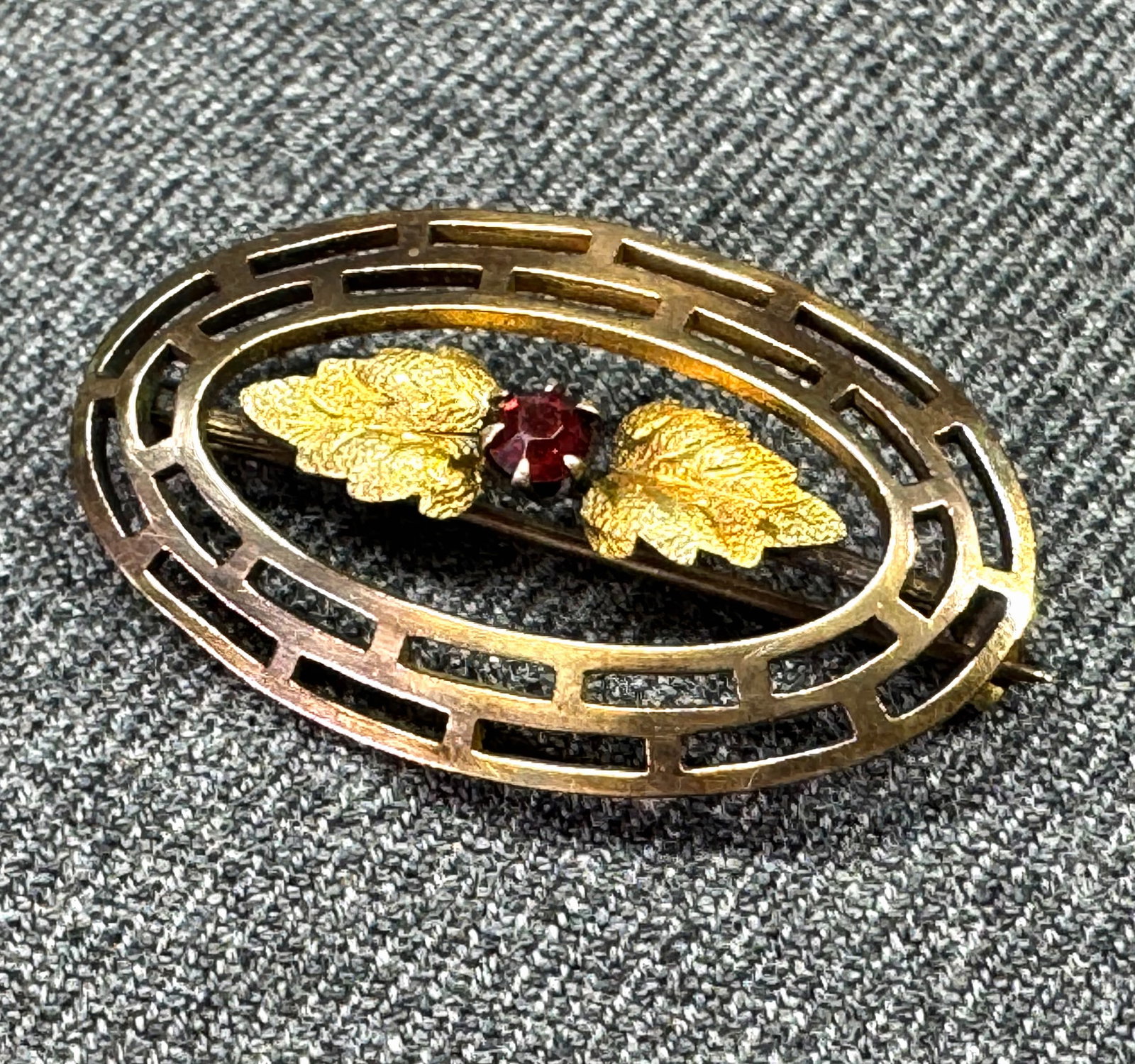 Antique Edwardian red crystal goldtone metal brooch pin. Marked C.T. on clasp: Antique Edwardian red crystal goldtone metal brooch pin. Marked C.T. on clasp. For measures please refer to the pictures taken with a measuring tape. Weight: 3 Grams IN HOUSE Estimated* SHIPPING & HAN
