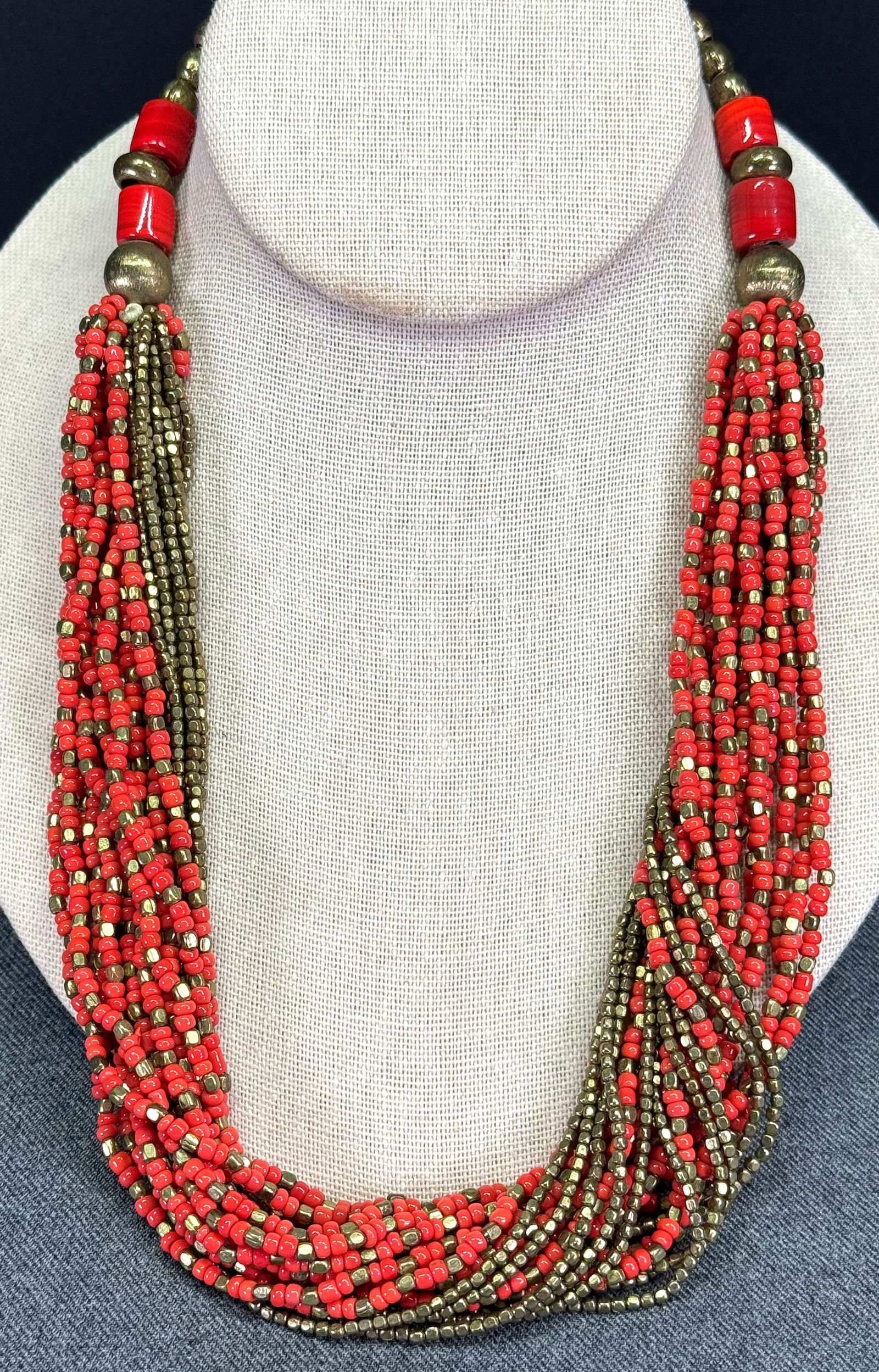 Vintage ethnic style coral & golden color glass multistrand necklace.: Vintage ethnic style coral & golden color glass multistrand necklace. For measures please refer to the pictures taken with a measuring tape. Weight: 120 Grams. This is a NO RESERVE AUCTION: there are