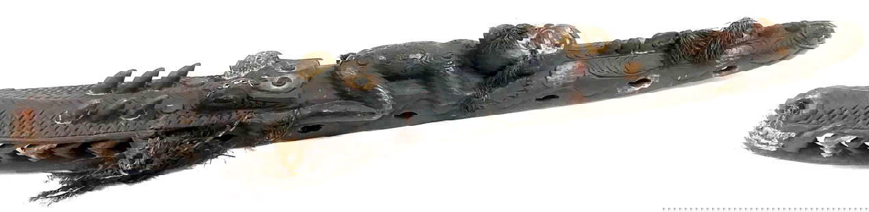 Papua New Guinea Middle Sepik Area Ceremonial Carving 42 inches: Papua New Guinea Middle Sepik Area Ceremonial Zoomorphic and Anthropomorphic Carving. Carved wood, nasa shells,fibers, pigments. It measures 42 inches long, 4 inches widest and 4 3/4 inches tall. Weig