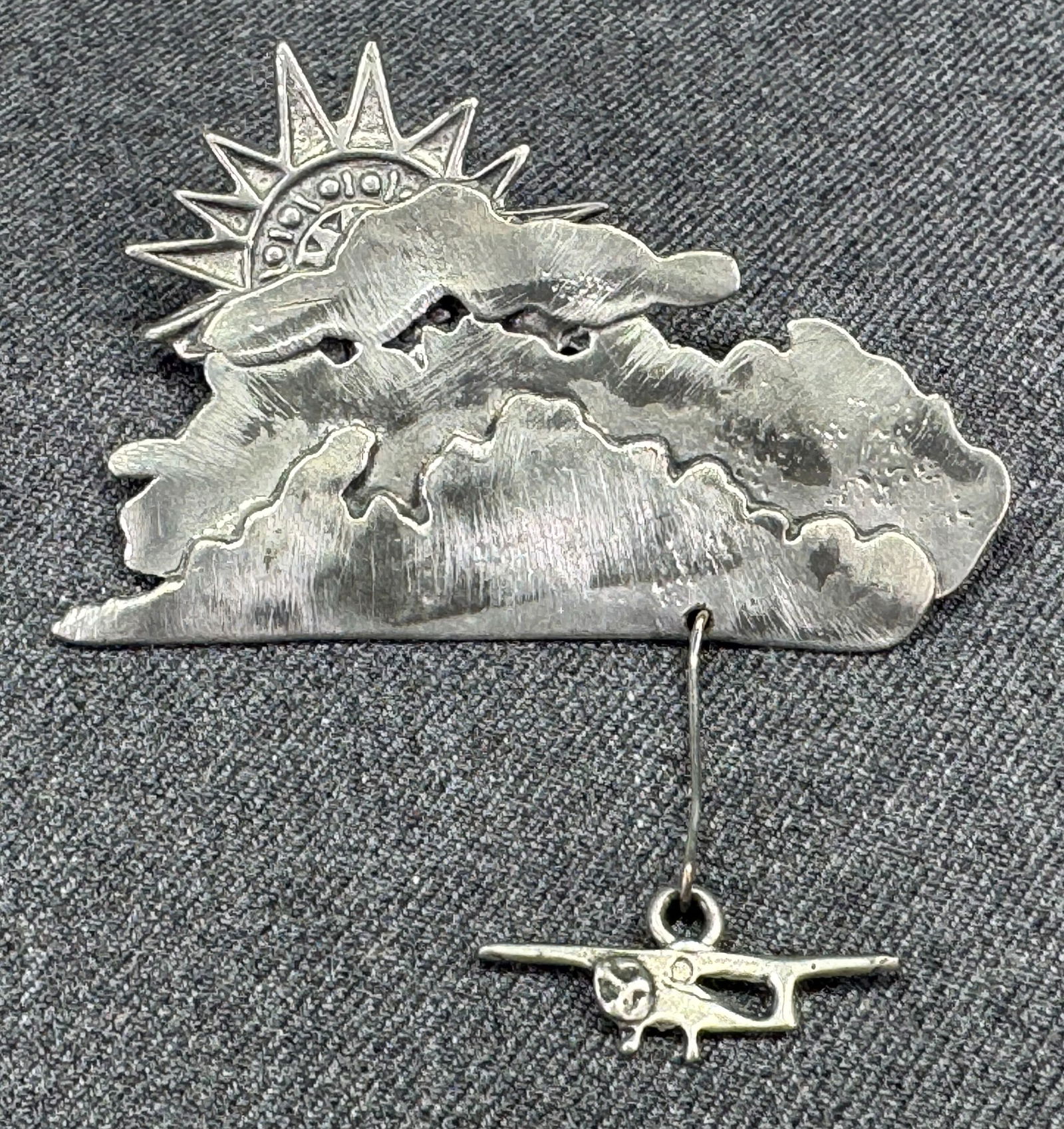 Vintage artsy sun coming out of clouds pewter brooch pin with airplane dangle (1 of 8)