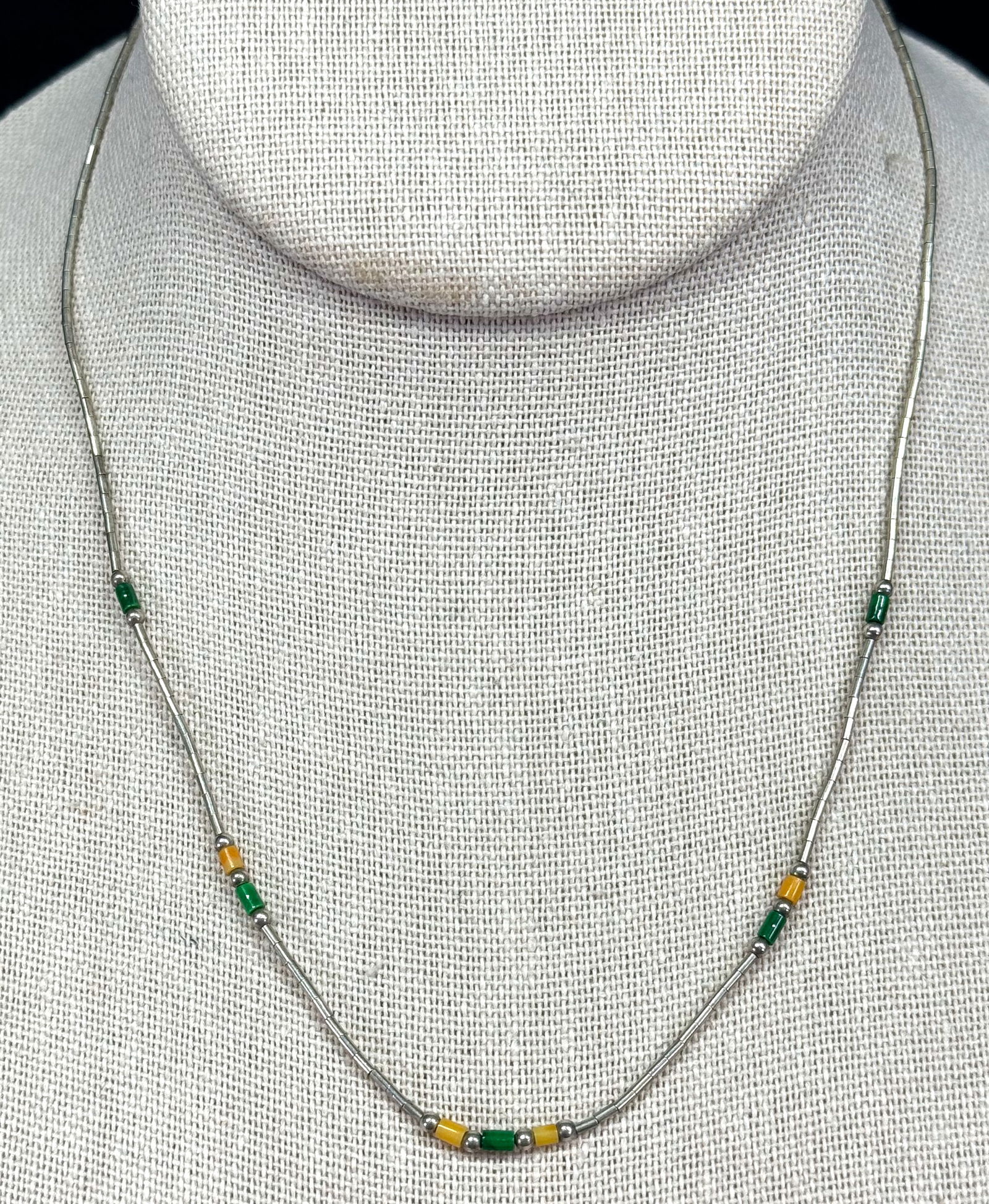 Vintage native american green & orange glass, liquid silver beaded choker necklace: Vintage native american green & orange glass, liquid silver beaded choker necklace. For measures please refer to the pictures taken with a measuring tape. Weight: 3 Grams. This is a NO RESERVE AUCTION