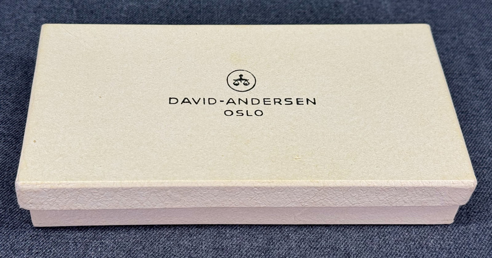 Vintage David - Andersen Oslo cardboard jewelry box . Empty: Vintage David - Andersen Oslo cardboard jewelry box.Empty. For measures please refer to the pictures taken with a measuring tape. IN HOUSE Estimated* SHIPPING & HANDLING COST WITHIN THE U.S. : $7 WE C