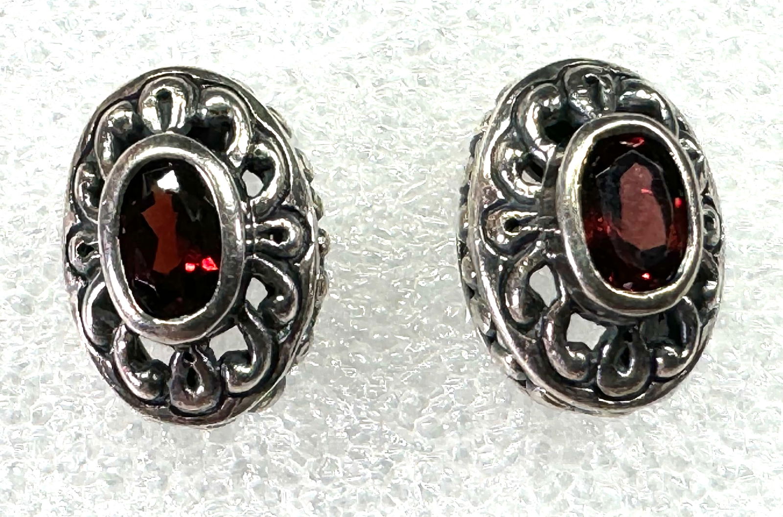Artisan handcrafted faceted garnet sterling silver stud earrings. (1 of 6)