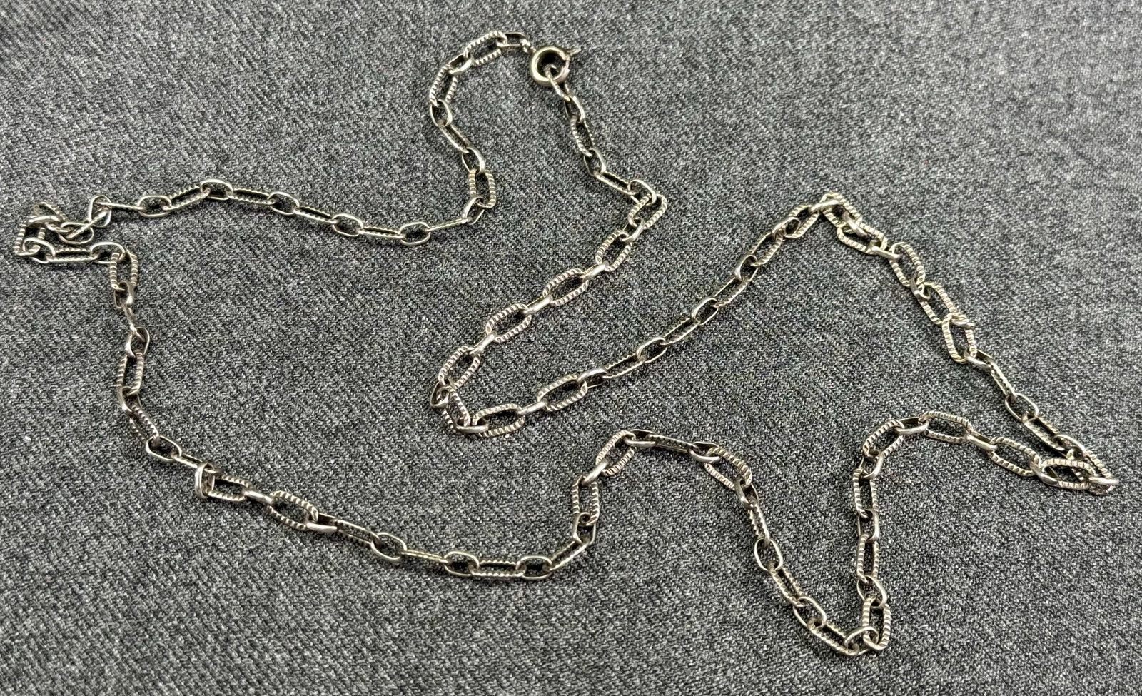 Antique sterling silver textured chain necklace. Marked 800 & hallmark: Antique sterling silver textured chain necklace. Marked 800 & hallmark. For measures please refer to the pictures taken with a measuring tape. Weight: 7.66 Grams. IN HOUSE Estimated* SHIPPING & HANDLI
