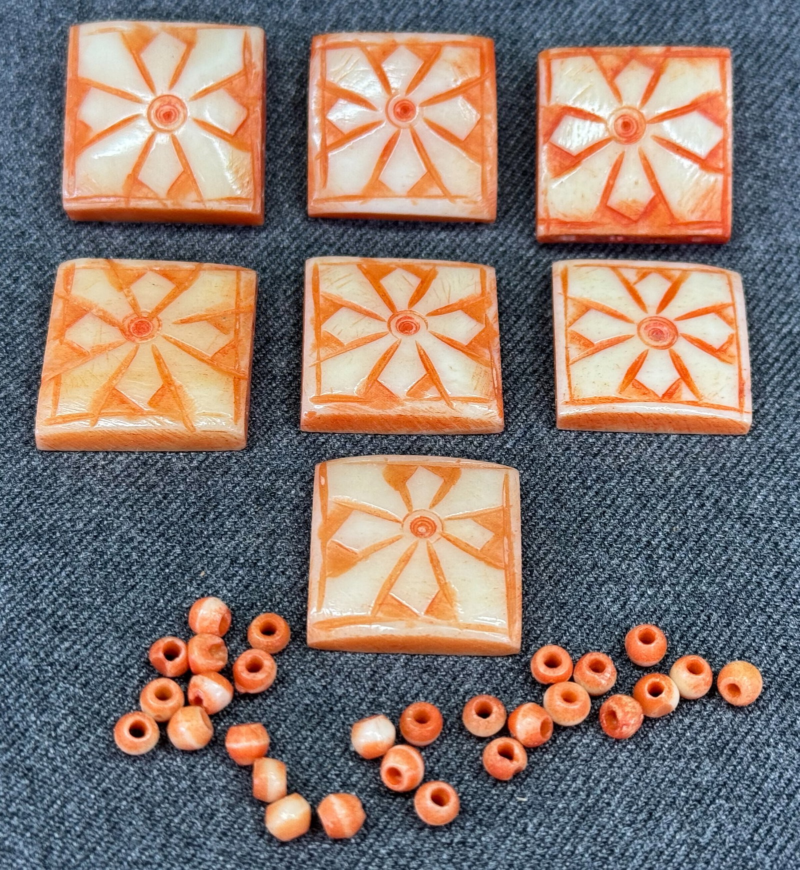 Vintage assorted orange and creamy bone flower face tile & rounded beads. Lot of 7 tiles: Vintage assorted beige and creamy bone sun face tile beads. Lot of 7 with 4 holes on sides. Unmarked. For measures please refer to the pictures taken with a measuring tape. Weight:30 Grams. IN HOUSE E