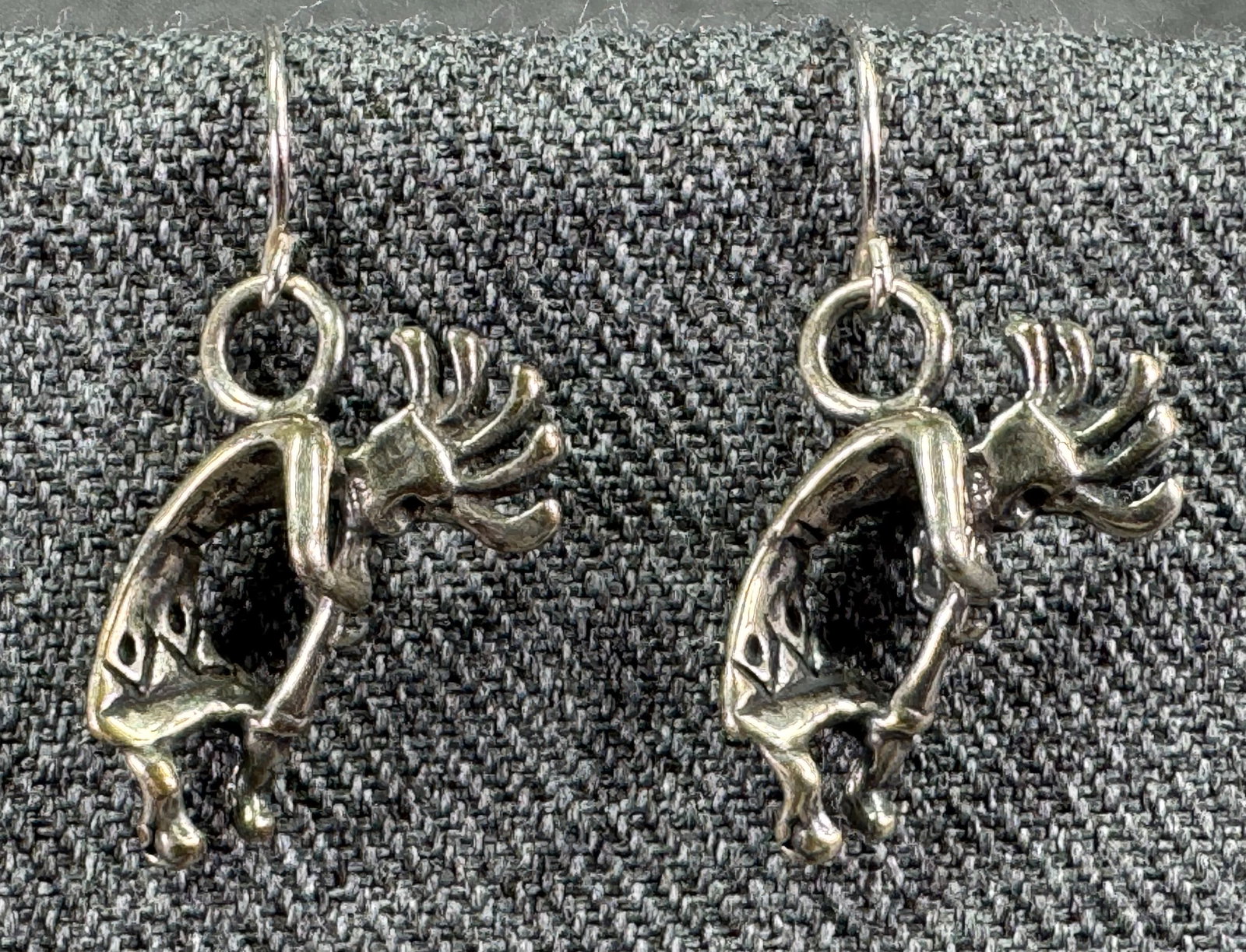 Vintage Native American Kokopelli sterling silver hook earrings: Vintage Native American Kokopelli sterling silver hook earrings. Marked 925 on the hook. For measures please refer to the pictures taken with a measuring tape. Weight: 4.51 Grams. IN HOUSE Estimated* 